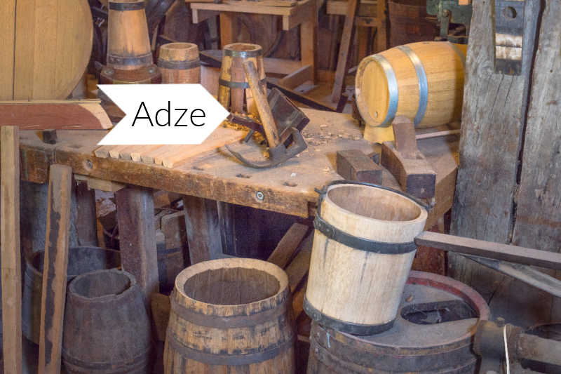 An adze on a cooper's work bench