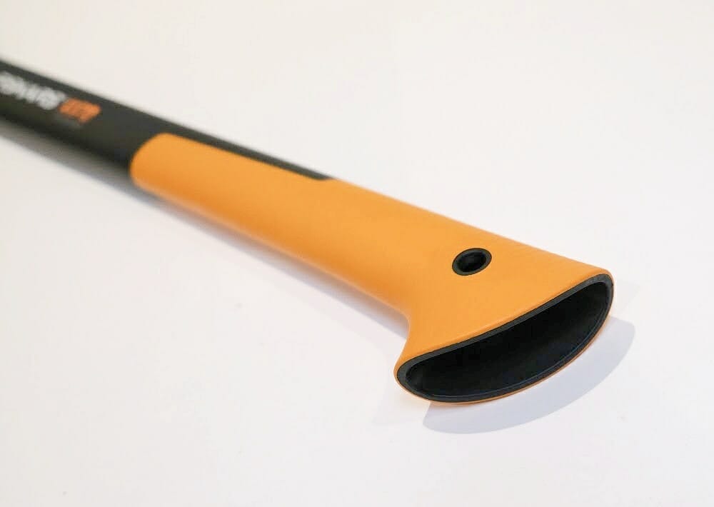 The handle of a Fiskars X17 on a white background