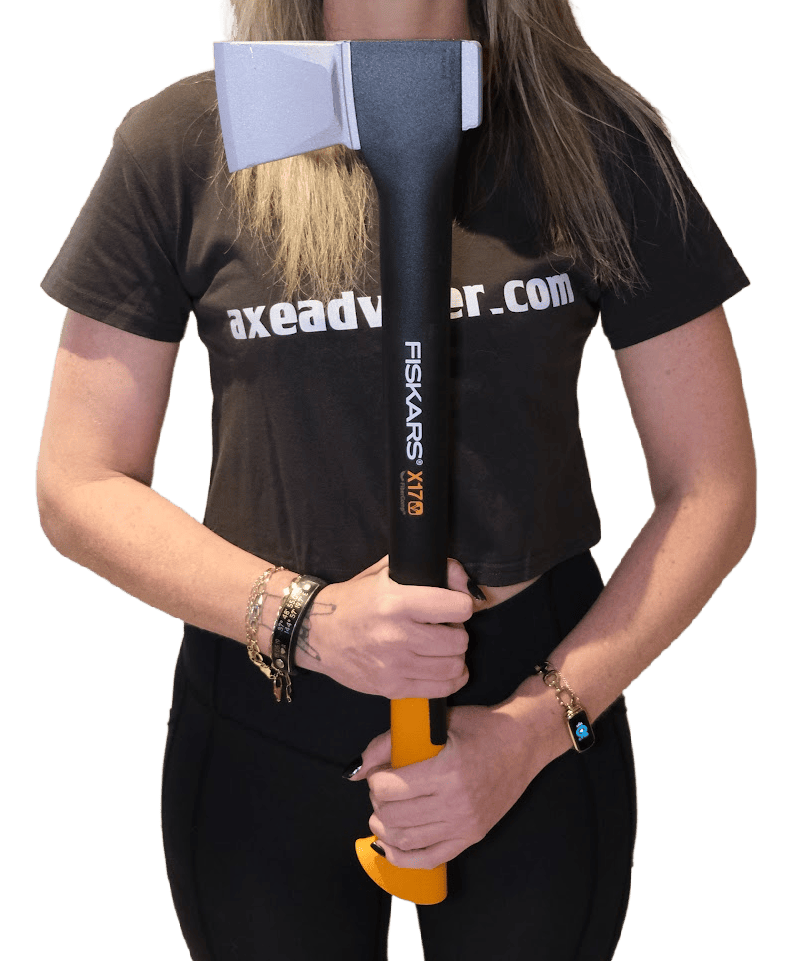 Vertical shot of a woman holding the Fiskars X17 Splitting Axe to demonstrate the handle length